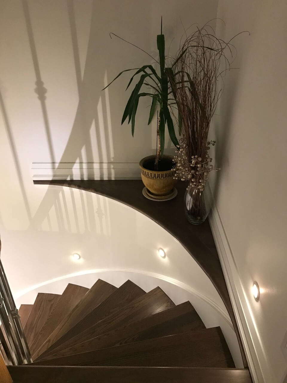 Stairs lighting round recessed into wall